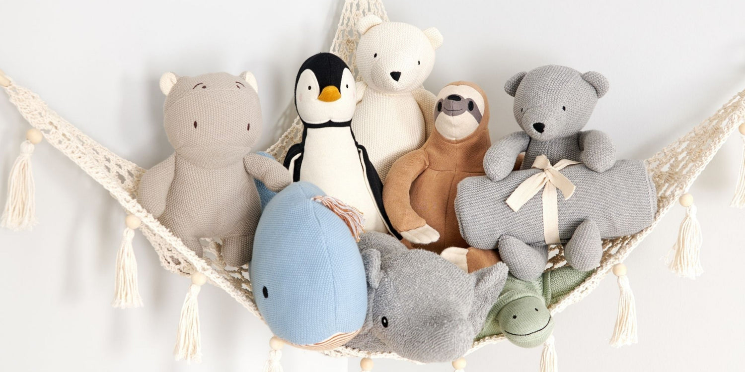 Naturepedic organic stuffed animals in a hammock
