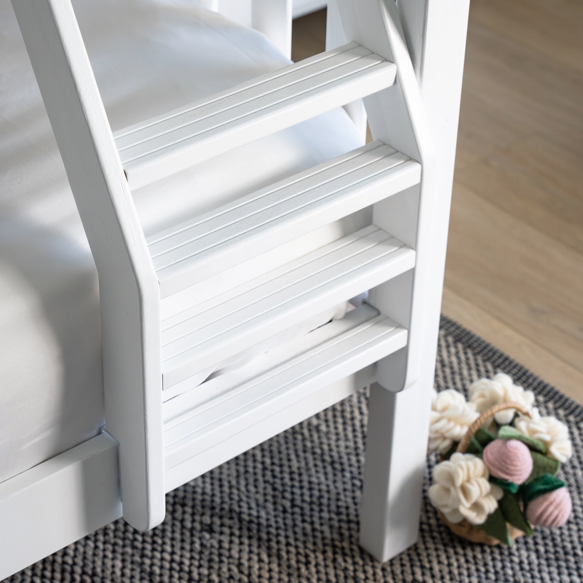 White wooden step ladder on a textured rug. #color_washed white #size_Twin/Full Bunk