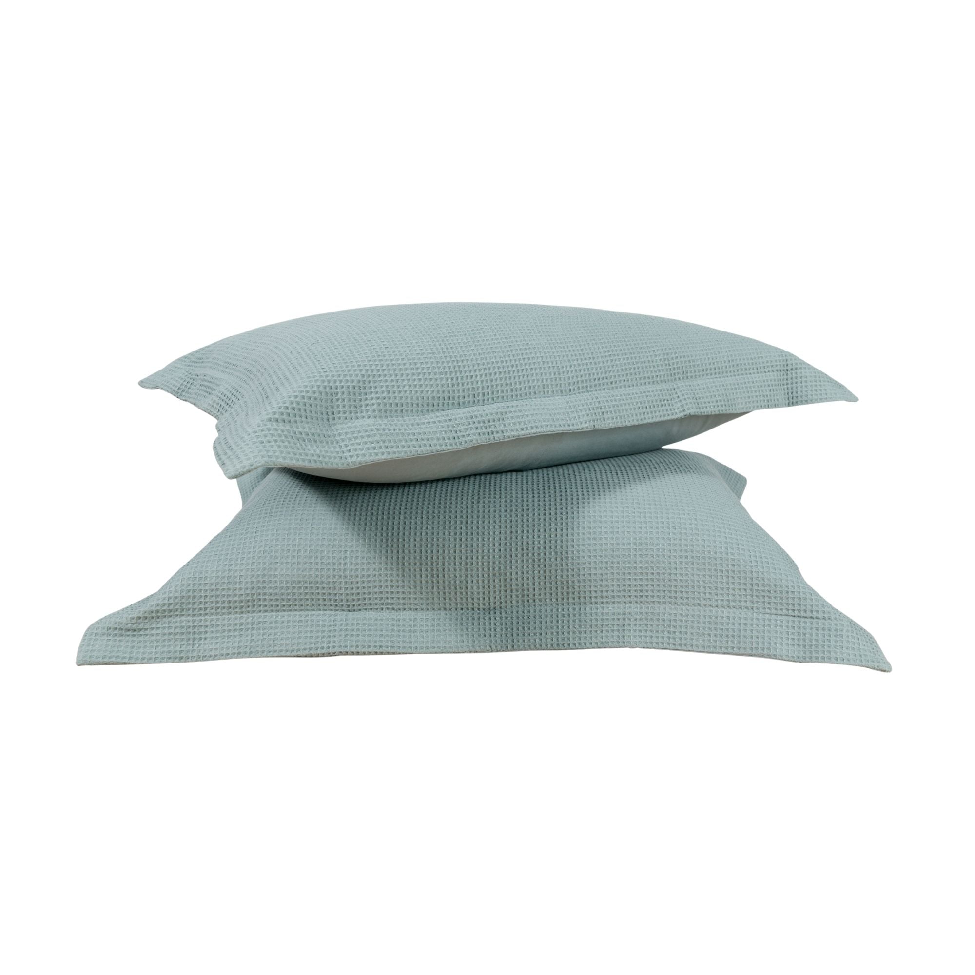 Two pillow shams on a white background. #color_harbor island