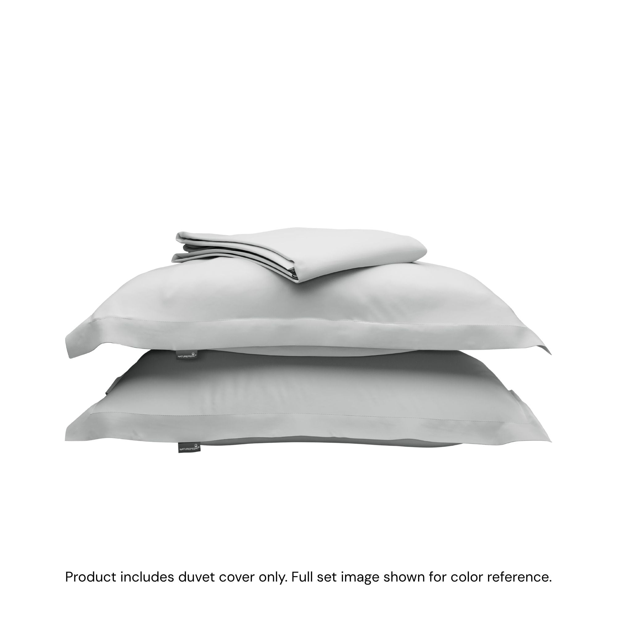 A folded duvet cover sitting on top of two pillow shams #color_mist