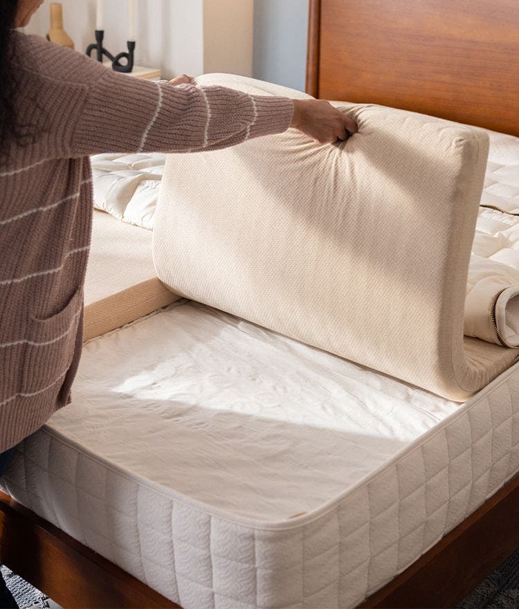 Laying down inner layers of EOS customizable organic mattress