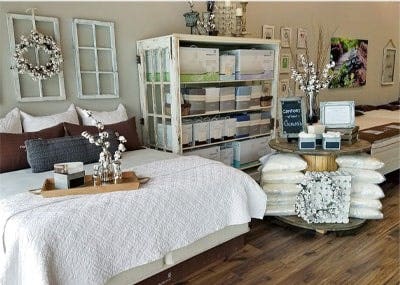 luxury mattress and accessory rack inside organic mattress gallery in Dallas Texas