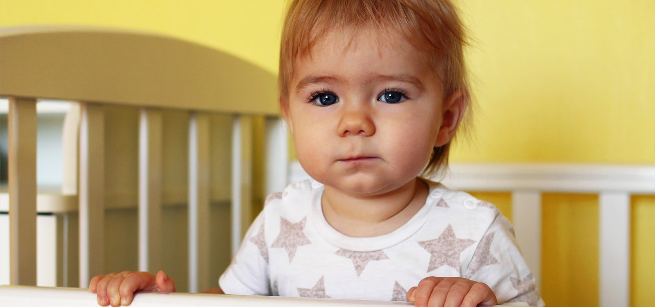 1-year-old standing up and crib and refusing to sleep