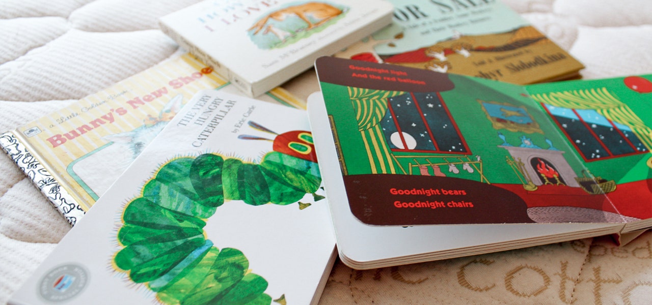 Pile of classic children's books including Goodnight Moon and The Hungry Caterpillar