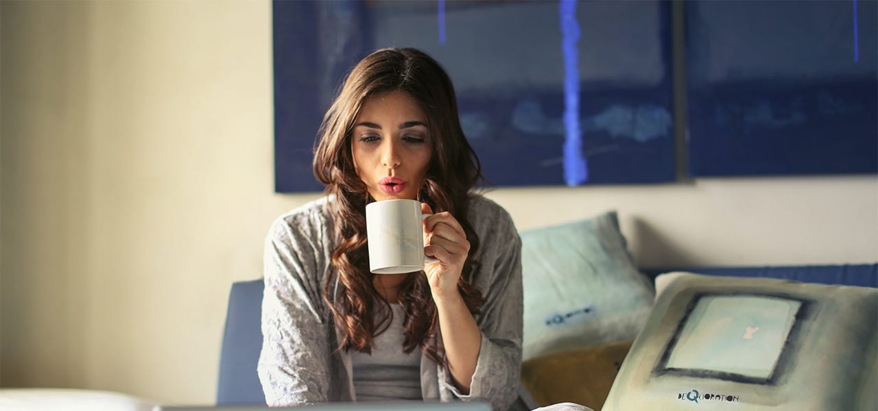 Woman drinking a cup of coffee