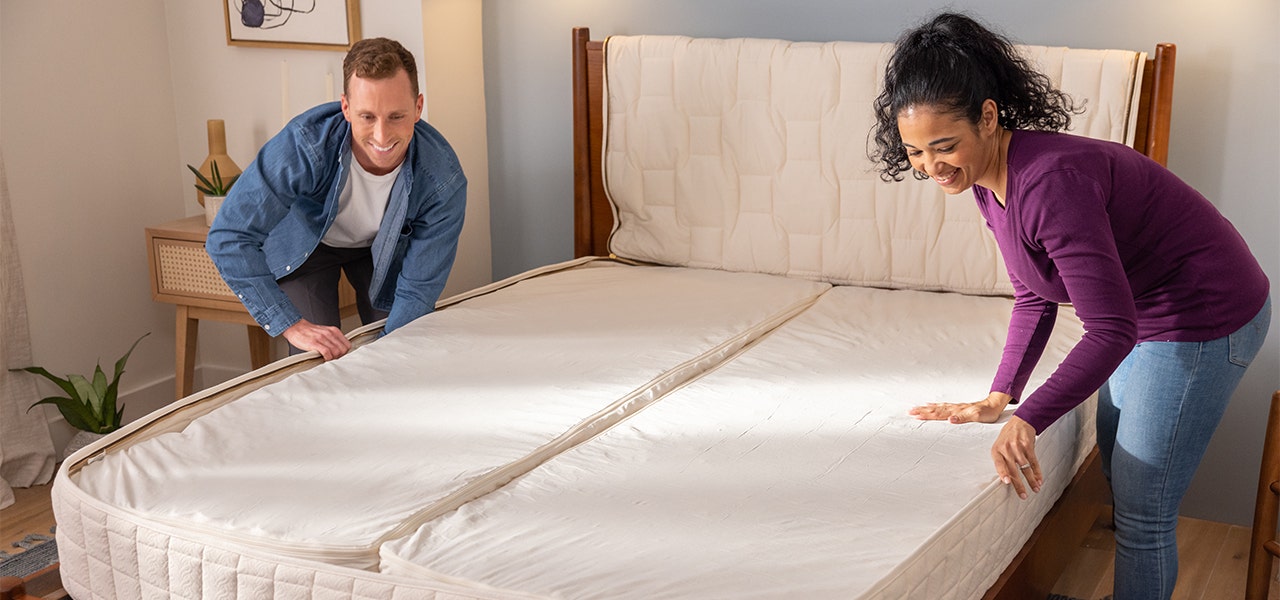 Couple assembling a customizable EOS organic mattress