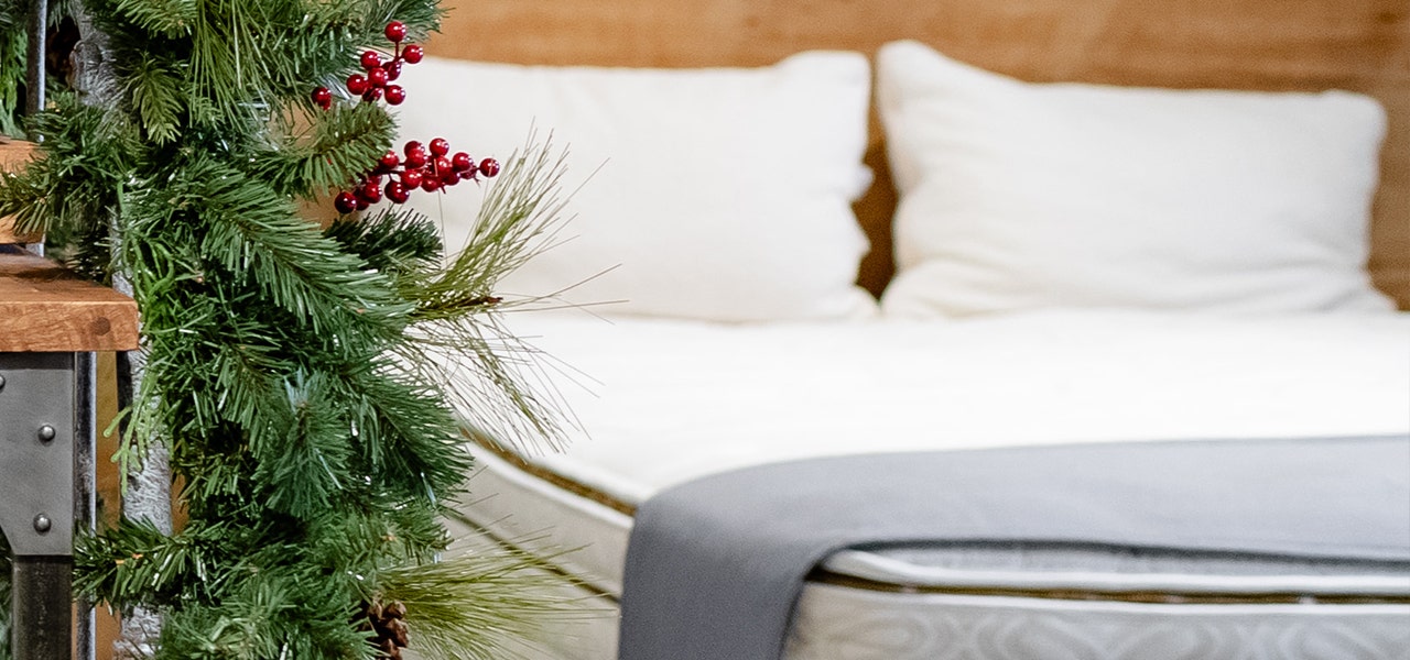 holly garland with naturepedic mattress in the background