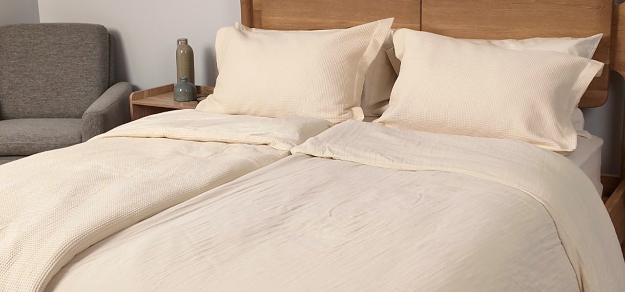 scandinavian sleep method style bed with two duvets