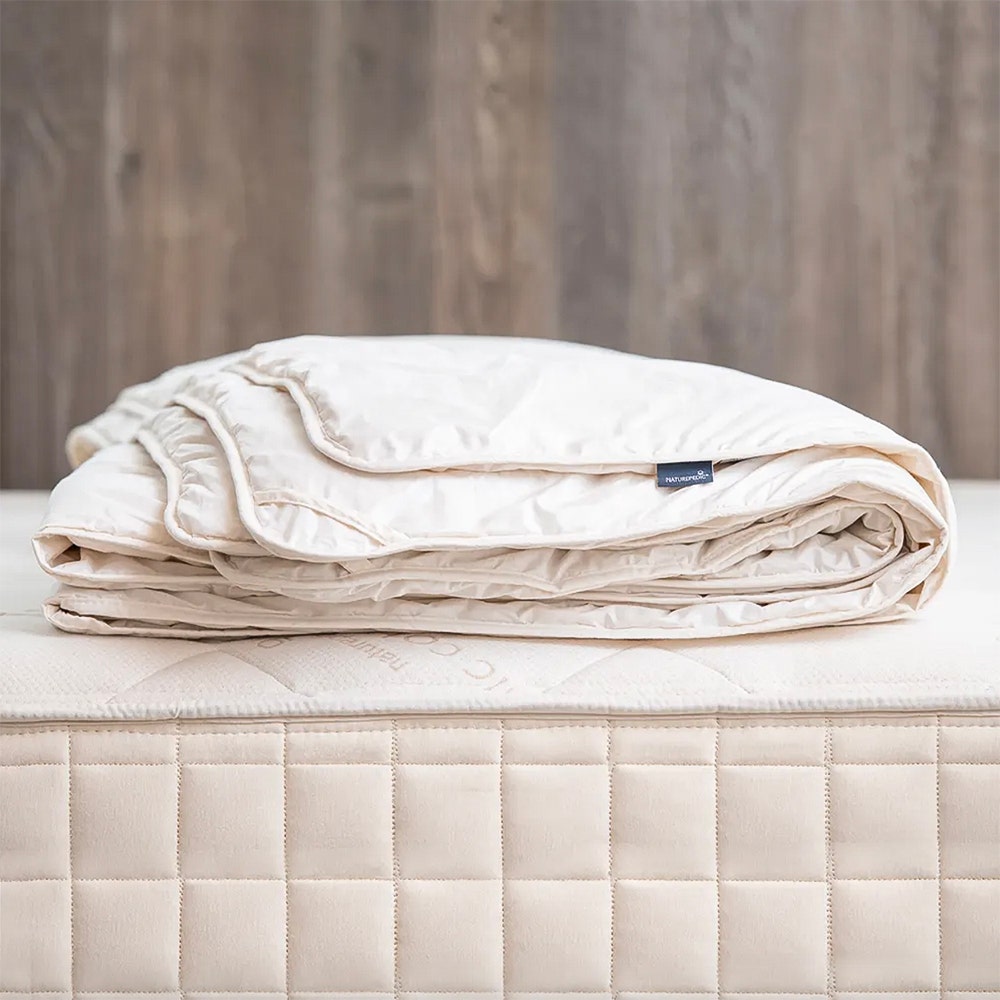 Alpaca topper folded on bed
