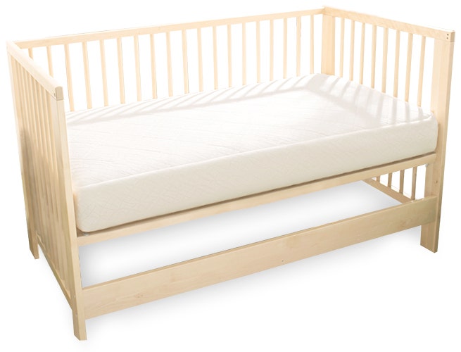 Breathable Ultra crib mattress in wooden crib